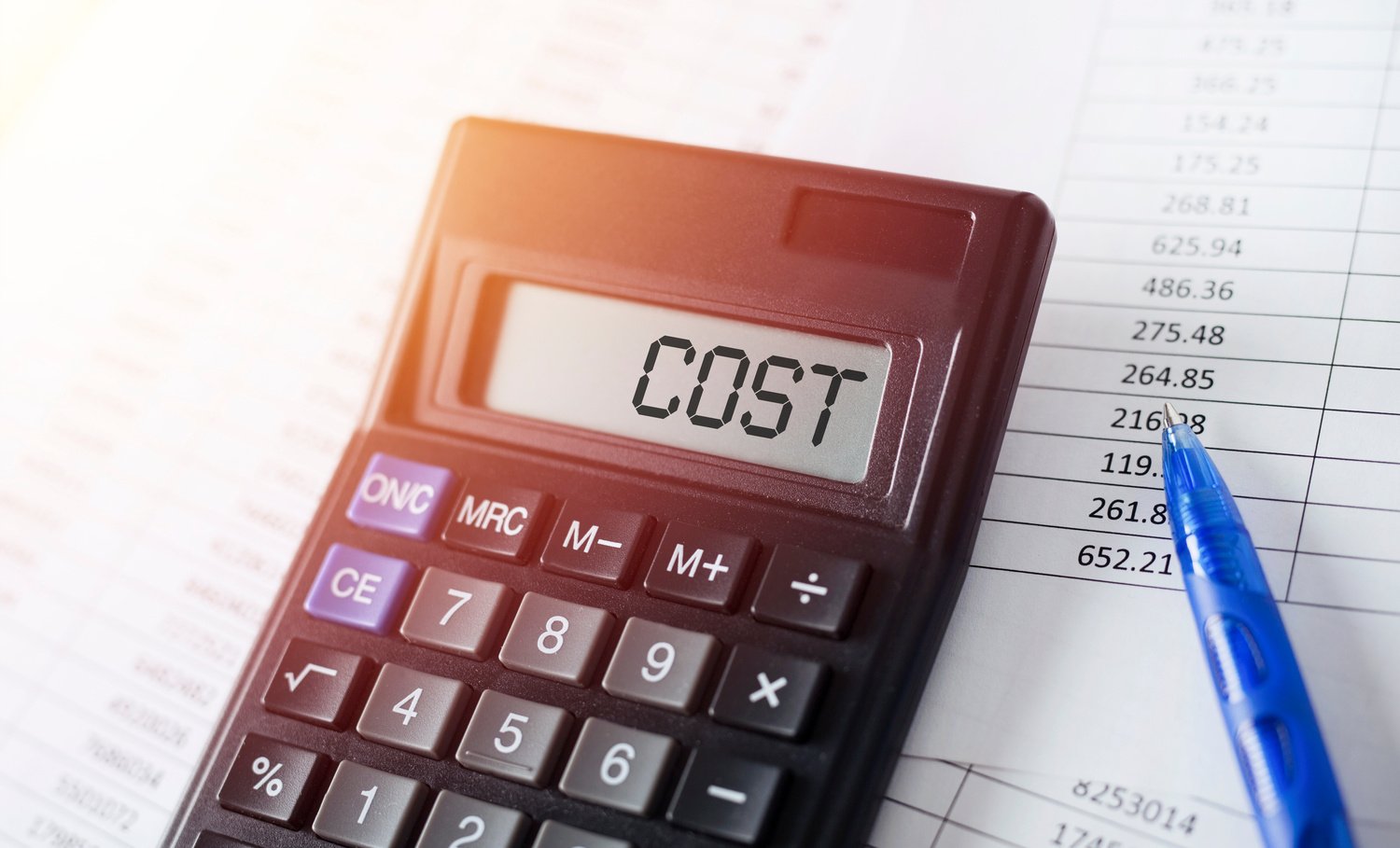 Word Cost on calculator. Costs optimization business concept.